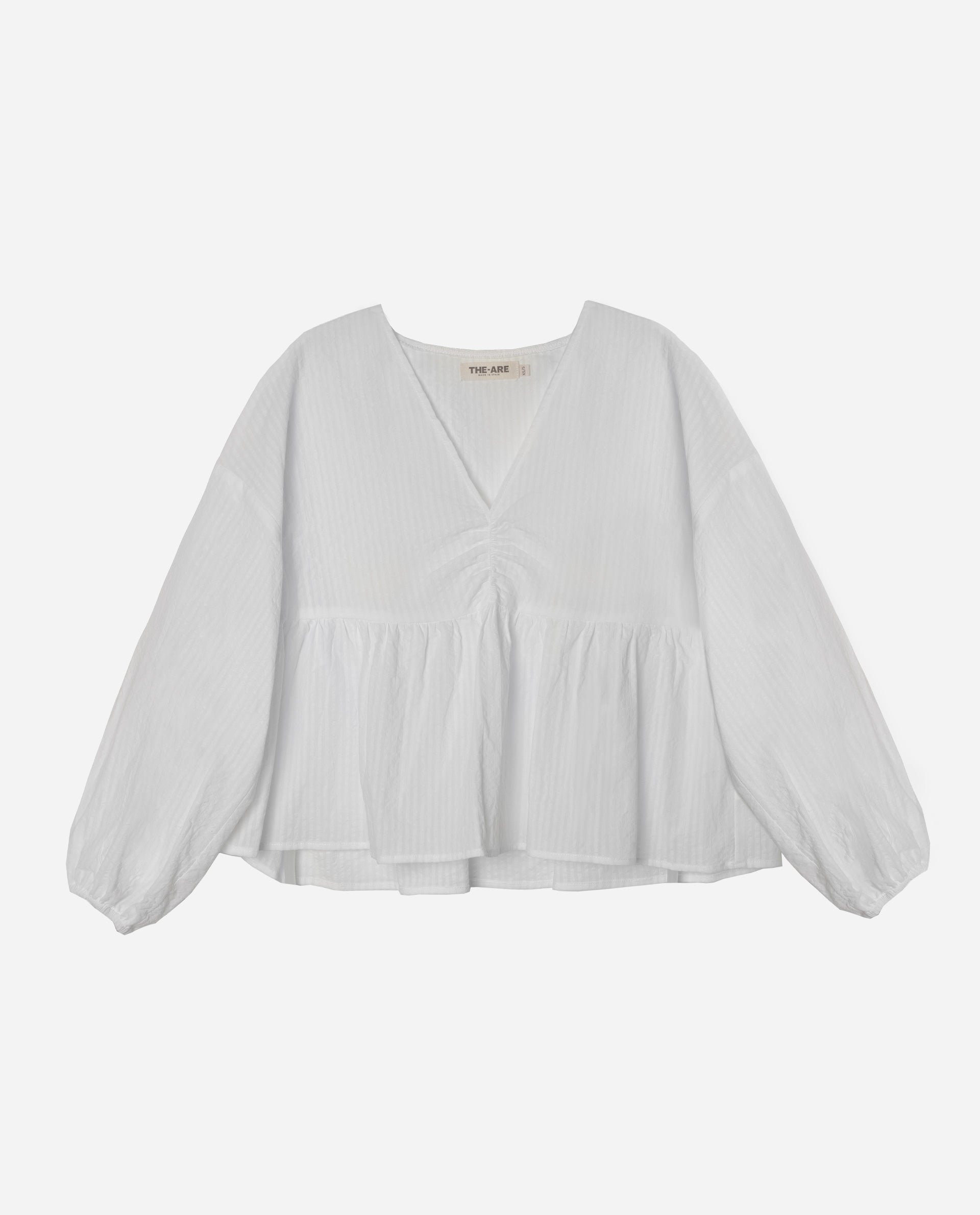 Blusa blanca escote discount pico