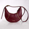 Bolso Granate de Piel Forma de Media Luna y Tachuelas | THE-ARE